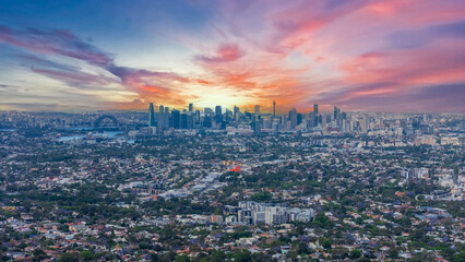 Panorama Sunset  aerial drone view of western Sydney Suburbs of Canterbury Burwood Ashfield Marrickville Campsie with Houses roads and parks in Sydney New South Wales NSW Australia