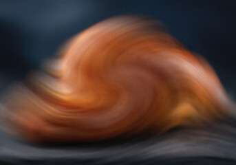 Golden Croissant on Slate Surface with Salt Crystals Under Dark Moody Lighting