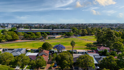 Panorama Sunset  aerial drone view of western Sydney Suburbs of Canterbury Burwood Ashfield...
