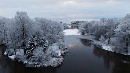 View of Pszczyna town, park and castle during a winter time