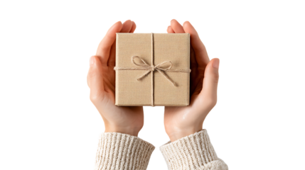 Hands holding a small square gift box wrapped in burlap, isolated on transparent background