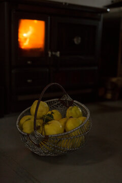 basket of quince by fire place