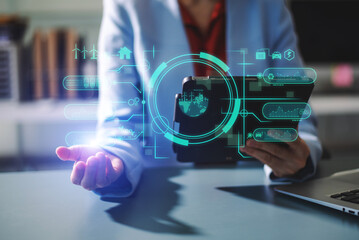 Woman using futuristic interface with smart tech and mobile to manage ESG, clean energy, and sustainability data.