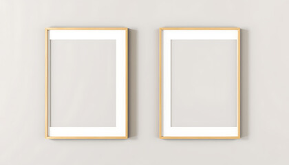 Two vertical picture frames with a thin gold border minimalist design perfect for showcasing artwork or photography in a modern interior