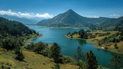 Scenic Views of Brava Lake in Huehuetenango, Guatemala: Serene Water, Lush Mountains, and Clear Blue Sky