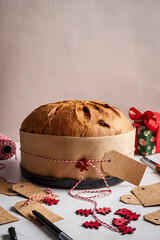 Italian panettone. Traditional Italian Christmas cake on delicate background.