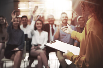 Group of coworkers at seminar in office