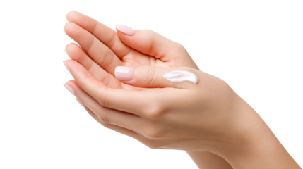 Beautiful young woman applying moisturizing cream on hands with soft skin care treatment and gentle skincare beauty routine
