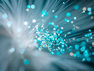 Abstract close-up of fiber optic cables emitting vibrant blue and white light points creating a futuristic and dynamic visual effect suitable for technology themes