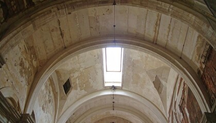 Fototapeta premium Flygen Plaster Vault Arch With Skylight: Tonal Whites and Contemplative Calm