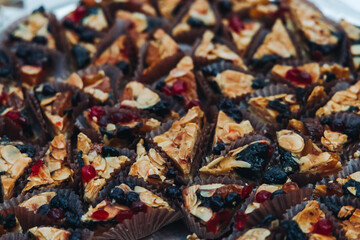 Set of coffee break in the hotel during conference meeting, with tea and coffee catering, decorated catering banquet table with variety of different pastry and bakery, with croissants, pie and cookies