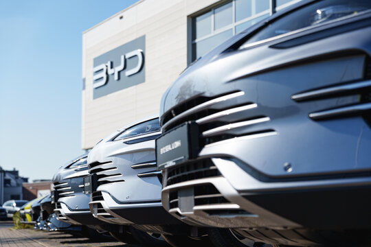Dusseldorf, Germany - September 28 2025: Newly opened Chinese automaker company BYD dealership with cars for sale parked in front of it