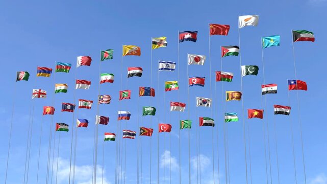Group of asian country flags waving against a blue sky