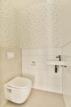Modern minimalist bathroom with geometric wall design