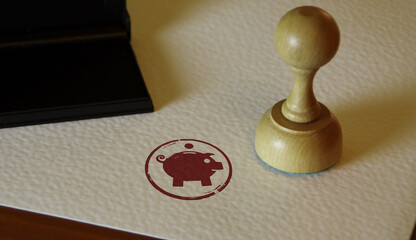 Piggy bank stamp and stamping