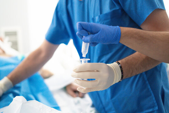 Nursing assistants providing care in ICU setting