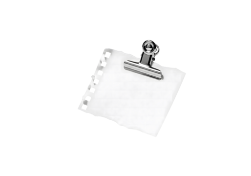 A clean, minimalist shot of a notepad held securely by a metallic clip