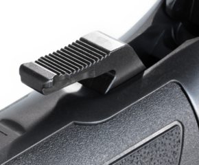 Grooved lever action rifle hammer cocked back