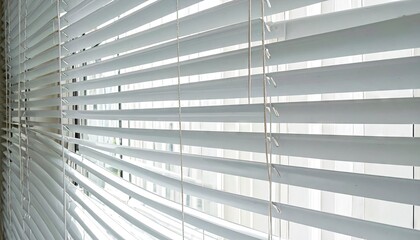 Obraz premium White Horizontal Blinds Casting Shadows Architectural Light