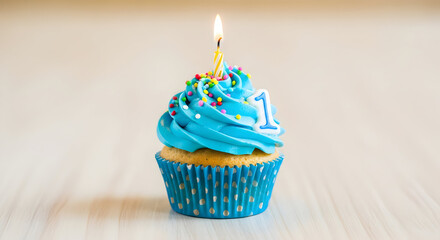 Blue Birthday Cupcake with Lit Candle & Sprinkles - Festive Celebration Dessert