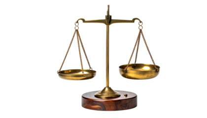 Gold scales balance on wooden base, against a black backdrop