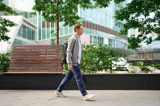 Man walking outdoors in urban office area