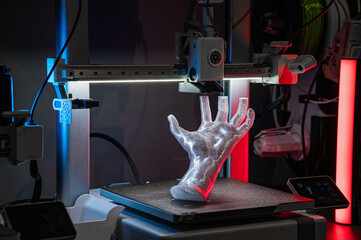 Modern 3D printer creating complex object