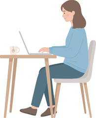 Fototapeta premium A woman sits at a table, working on a laptop, with a cup of tea.