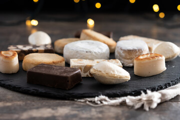 Traditional Spanish Christmas sweets assortment on wooden table