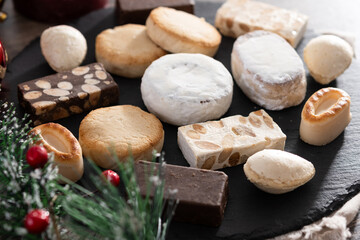 Traditional Spanish Christmas sweets assortment on wooden table