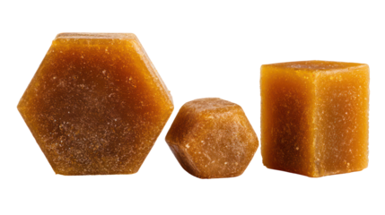 Sets of jaggery in rectangular cylindrical and triangular shapes on transparent background
