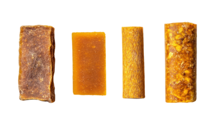 Sets of jaggery in rectangular cylindrical and triangular shapes on transparent background
