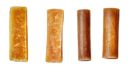 Sets of jaggery in rectangular cylindrical and triangular shapes on transparent background