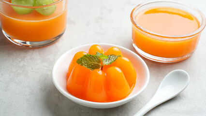 Delicious Mango Milk Pudding with mint leaf