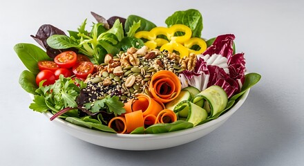 Delicious and colorful salad bowl with various fresh vegetables and nuts
