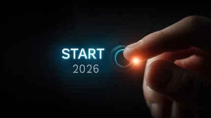 Finger pressing the start button for the year 2026 on a futuristic interface