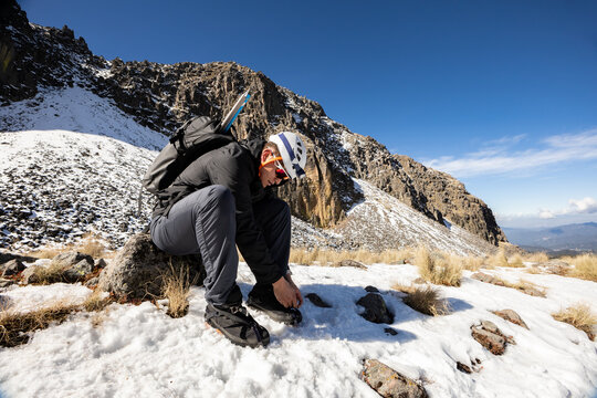 Winter hiking in snowy mountain landscape