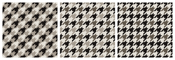 Set of abstract modern monochrome seamless geometric houndstooth patterns in gray on light background, simple vector illustration, flat style