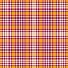 Warm autumnal plaid pattern. Texture of woven fabric with orange, purple, and cream colors. Great for backgrounds, designs, and textiles.