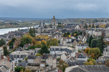 Fototapeta premium Blois, France - 10 27 2025: Panoramic view of the cityscape and Saint-Louis Cathedral from top of the Basilica Our Lady of the Trinity
