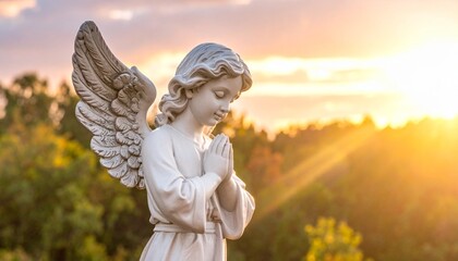 Praying spiritual angel figurine in scenic forest landscape background. Faith in God, Christianity church, pray, lent, religion concept. All saints day.