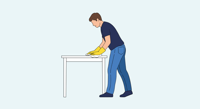 Dedicated man in yellow gloves meticulously cleaning a white table surface with a cloth, ensuring a spotless finish for a pristine environment