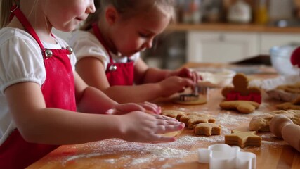 Two little girls baking christmas gingerbread cookies - Powered by Adobe