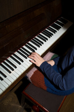 child playing piano
