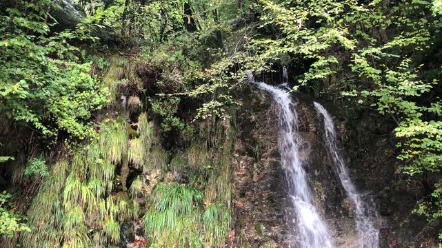 Little Waterfall of Oneta Mountain Village, in the Italian Alps. Bergamo Province, Italy