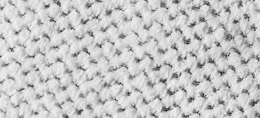 white braided material with an interesting pattern