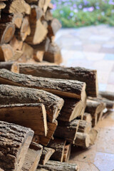 Preparing firewood for the winter. Oak timber.  Heating with the wood.