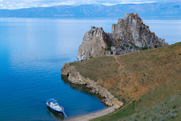 Boat at Shamanka Mountain on Olkhon Island. Baikal, Russia