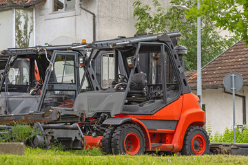 Several Used Old Forklift Trucks Parked Outside Ready for Recycling