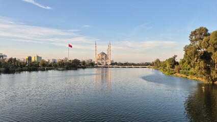 Naklejka premium Majestic Sabanci Mosque Overlooking the Seyhan River, Turkey